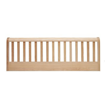 Hove vertical slatted headboard.