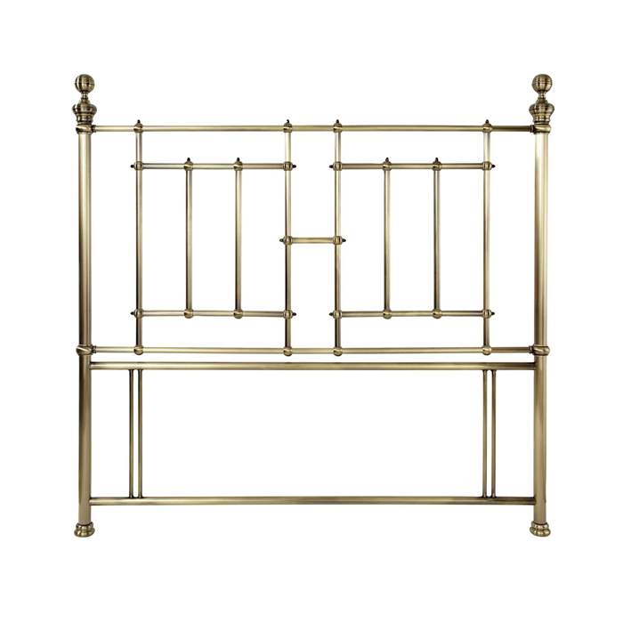 Regal antique brass double headboard.